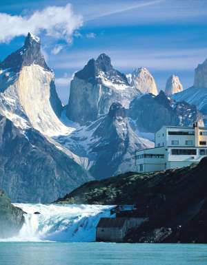 Explora Salto Chico hotel, overlooking Lake Pehoé, the Salto Chico waterfall and the Torres del Paine range.