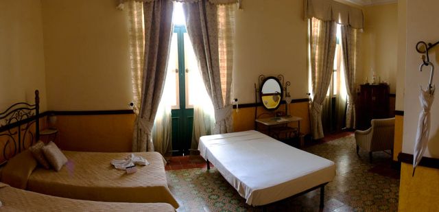Hotel Raquel's rooms have the spacious, palatial feel to them.
