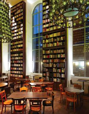 B2's bookish lobby features glass bottle chandeliers.