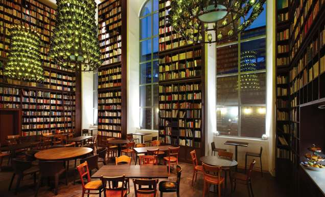 B2's bookish lobby features glass bottle chandeliers.