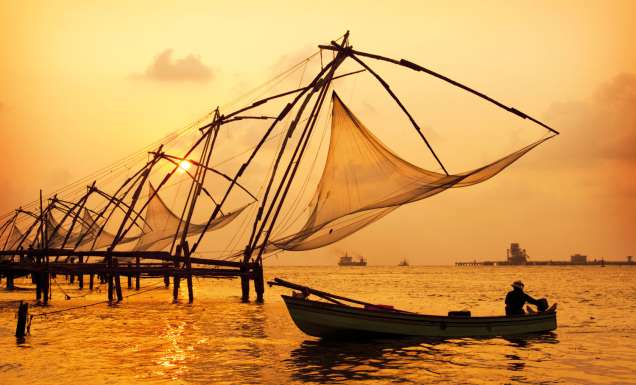Sunset over Chinese fishing nets in Fort Kochi India.