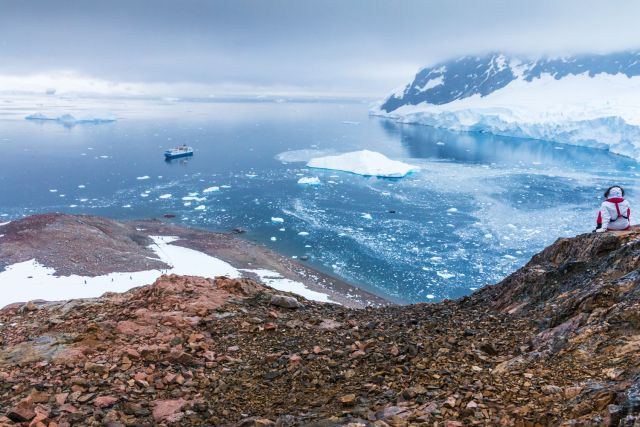 Panoramic view over glaciers and icebergs in Neko Harbour, Antarctica.