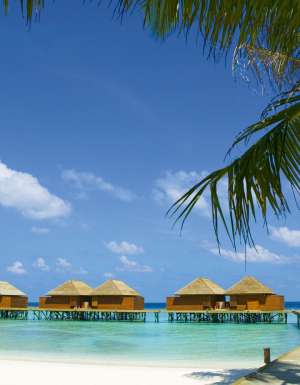 Veligandu Island is surrounded by a lagoon and a private house reef.