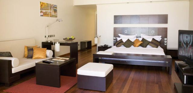 The simple and spacious interior of the jacuzzi water villa.