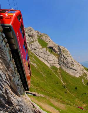 Take a journey up to the clouds on Switzerland’s steepest cogwheel railway.
