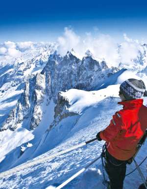 Skiers enjoying the view from Mont Blanc, France.
