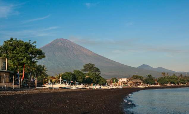 a black sand beach in Amed, Bali