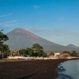 a black sand beach in Amed, Bali