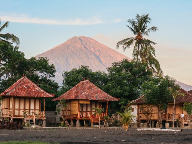 wooden bungalows with Mt Agung in the backdrop