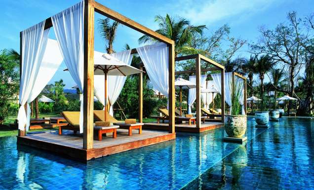 Poolside pavilions at The Sarojin resort in Khao Lak, Thailand.