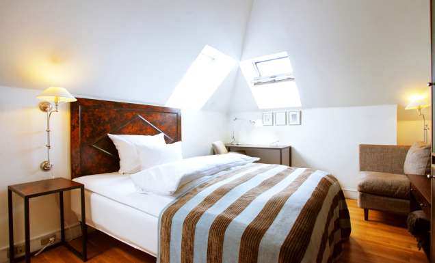 Inside a guest suite at Hotel Kong Arthur, Copenhagen.