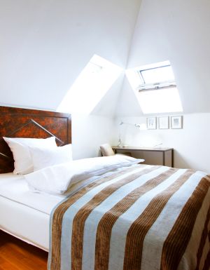 Inside a guest suite at Hotel Kong Arthur, Copenhagen.