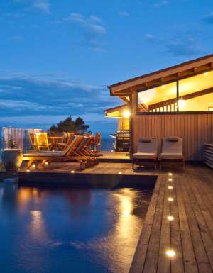 Split Apple Retreat - set high on a cliff-face on the seaside border of Abel Tasman National Park, on New Zealand’s South Island.