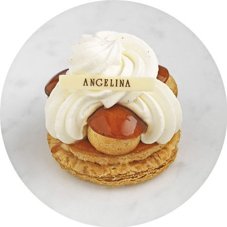 The renowned signature patisserie at Angelina - The Mont Blanc. A moorish mound of piped creme de marron (sweet chestnut puree) on a meringue base, sprinkled with icing sugar.