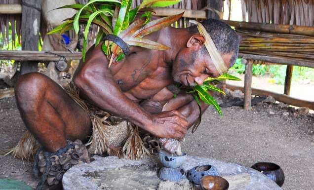 Chief making kava at Leweton Cultural Village, Vanuatu.