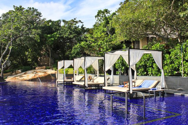 Vana Belle poolside day beds.