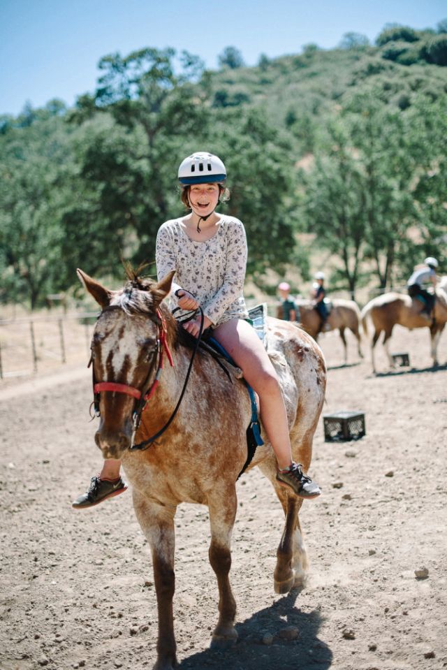 Horse riding at Jameson Ranch Camp, USA.