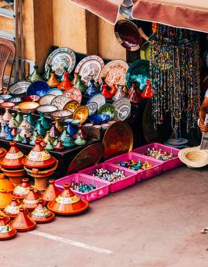Street vendor selling moroccan handicrafts at Marrakech Medina