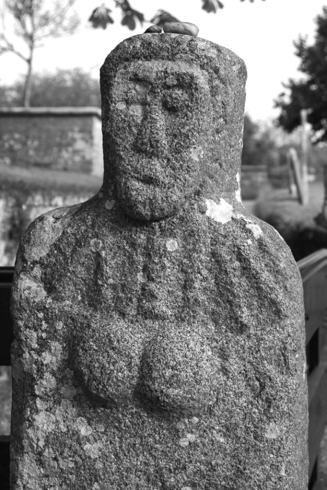 A Neolithic stone figure at the gates of St Martin’s church, Guernsey