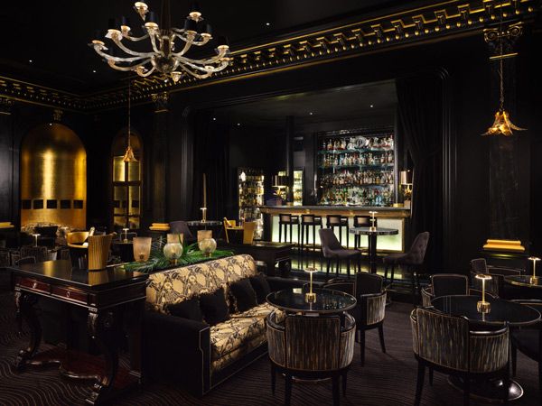 the elegant and dimly lit space at the Beaufort Bar, Savoy Hotel London