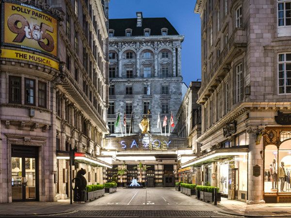 the look outside of The Savoy London at night