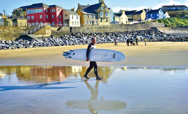 American surfer Shawn Hickey heading out for one of his first rides in Ireland at Lahinch.
