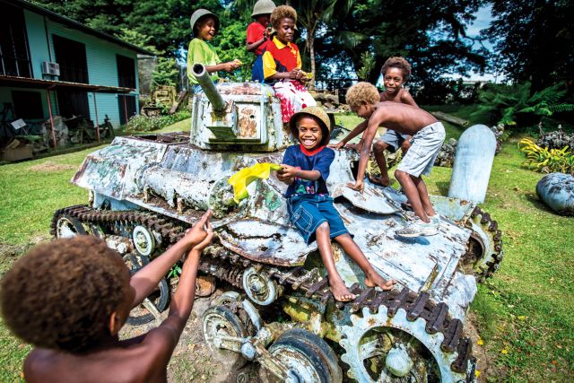 Kids playing at the Kokopo War Museum, Papua New Guinea.