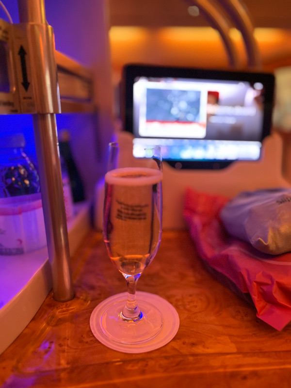 a glass of drink onboard Emirates A380