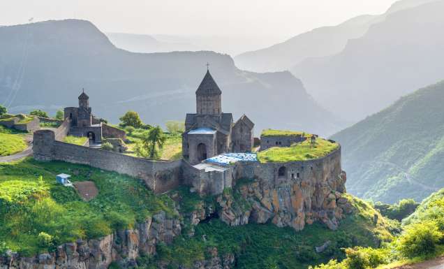 Ancient monastery in setting sun, Tatev, Armenia (photo: Alamy Stock Photo).