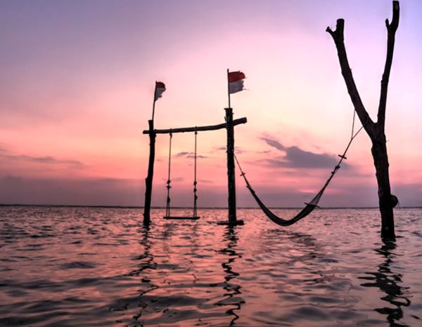 Swing over Bali water