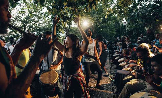 People dancing with drummers