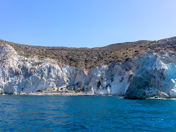 White Cliffs loom over White Beach, Santorini