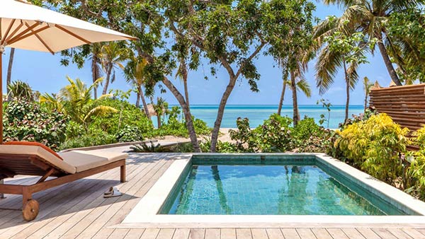 Beach front pool villa deck Six Senses Fiji