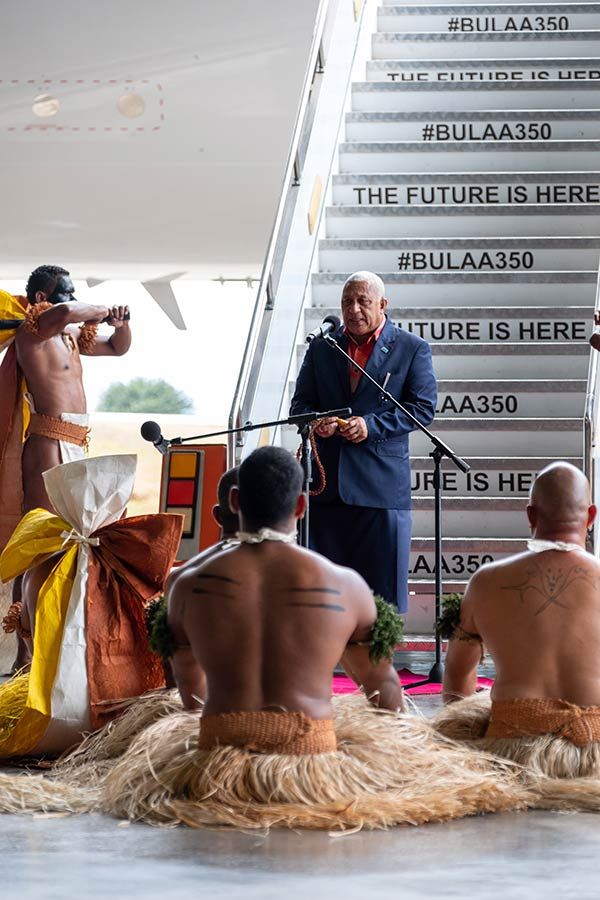 Prime Minister Frank Bainimarama accepting the trafitional welcome for Fiji Airways A350