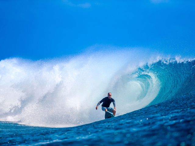 Surfing Cloudbreak in Fiji