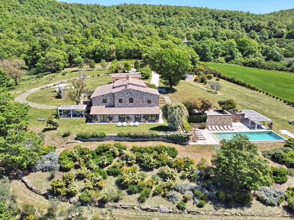an aerial view of Villa Sambuco in Tuscany, Italy