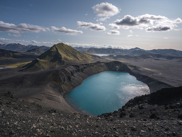 Hnausapollur is a volcanic crater with a stunning blue lake. 