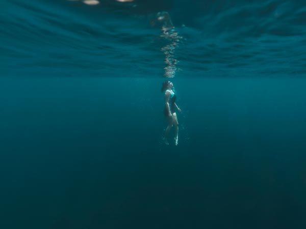 Swimming in a pristine mountain lake is breathtaking.