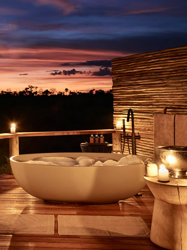 a candle-lit private tub at Sanctuary Baines