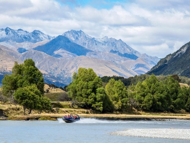 a jet ski along Dart River in Glenorchy