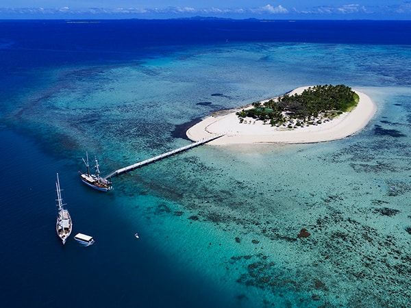 Aerial shot of Captain Cook Cruises in Fiji Islands.