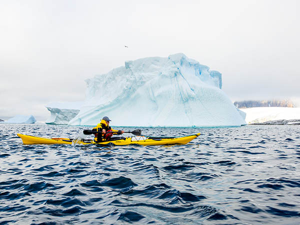 Kayaking in Antarctica, going close to icebergs