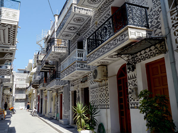 Geometric shapes painted onto stone buildings in Pyrgi town in Greece, Europe