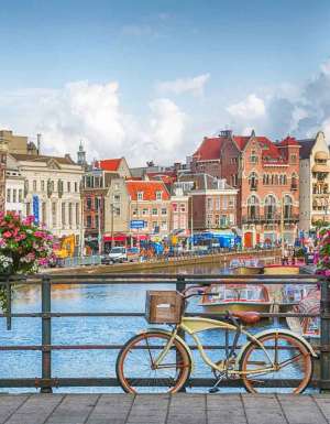Amsterdam, capital of the Netherlands, has more than one hundred kilometres of canals, about 90 islands and 1,500 bridges.