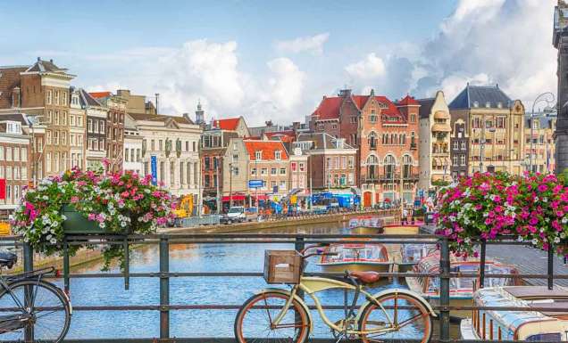 Amsterdam, capital of the Netherlands, has more than one hundred kilometres of canals, about 90 islands and 1,500 bridges.