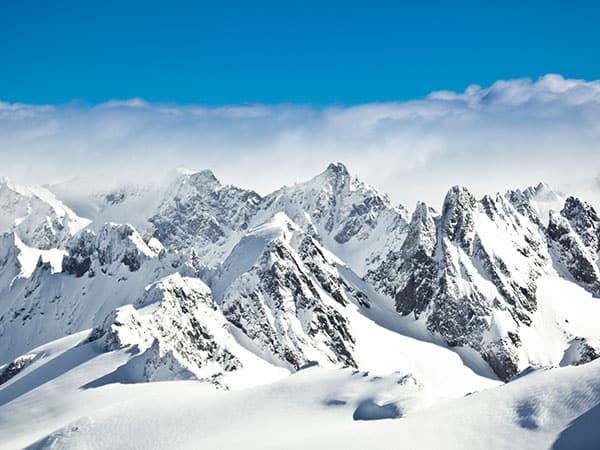 View over misty mountains from Mount Titlis, Engelberg, Switzerland