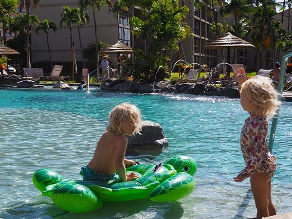 Children at the Aston Kaanapali Shores Main Pool, Maui, Hawaii, USA