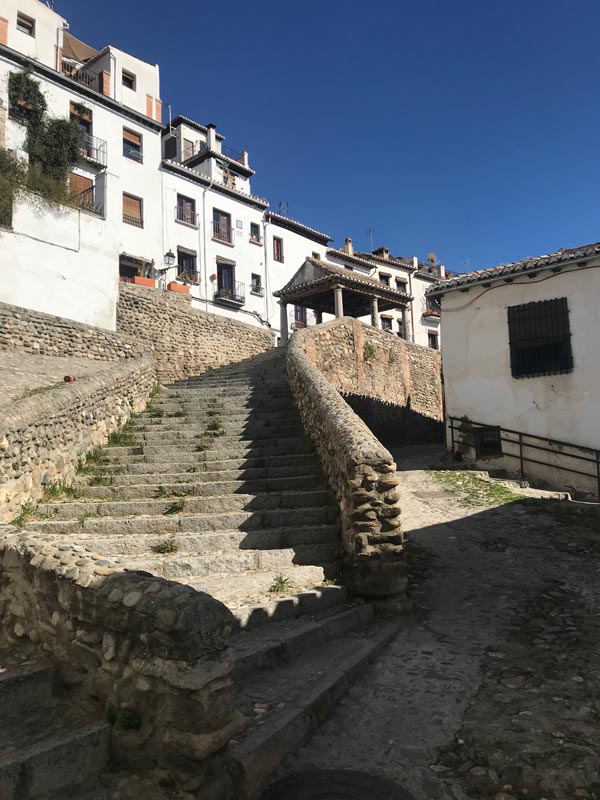 Staircase in the cobblestoned streets of Granada. (Image: Emily Murphy)