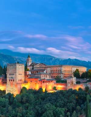 Alhambra during evening blue hour in Granada, Andalusia, Spain