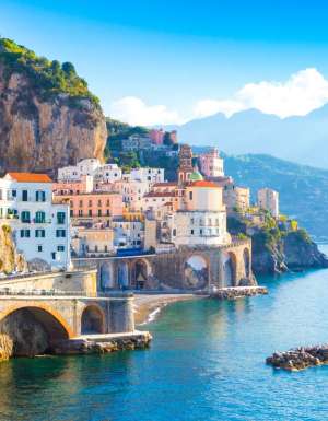 Morning view of Amalfi cityscape on coast line of mediterranean sea, Italy